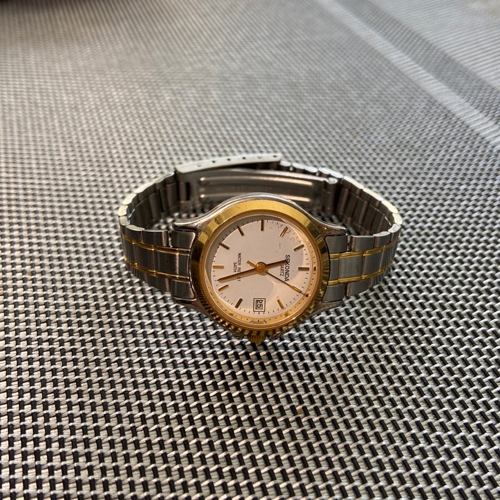 Silver and gold stainless steel watch